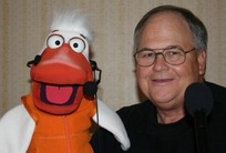 Performer Garry Lenon with DUCK puppet .